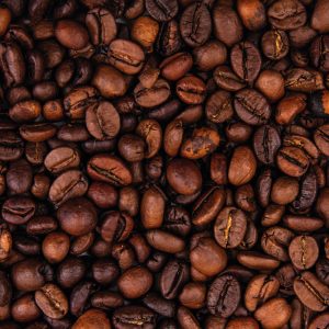 close-up-view-of-dark-fresh-roasted-coffee-beans-on-coffee-beans-background