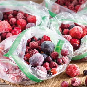 frozen-berries-black-currant-red-currant-blackberry-blueberry-raspberry-strawberry-cherry-plum-in-plastic-bag-on-table-frozen-food (1)